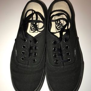 Black Vans Low Top Sneakers.